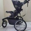 Baby Trend Jogger Stroller - Black and Grey Design - 5-point safety harness and smooth-rolling wheels